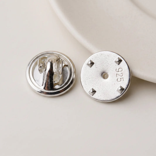 925 sterling silver locking pin back shown from front and back with 925 hallmark