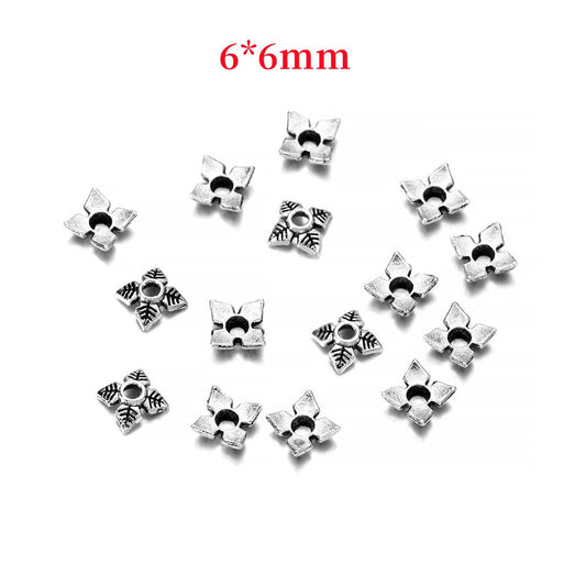 Capuchons de perles de fleurs antiques à 4 pétales de 6 mm, 50 pièces