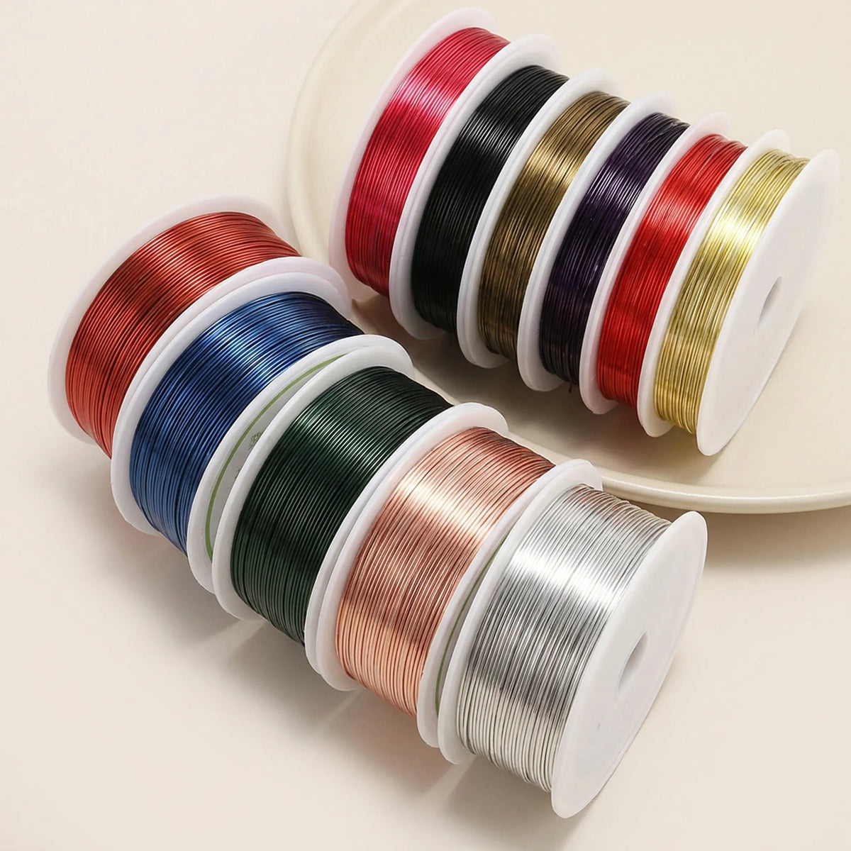 Assorted colored copper beading wire rolls for jewelry making projects