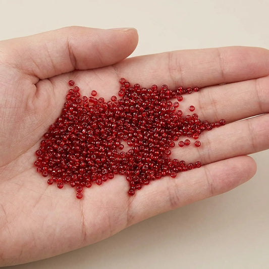 Dark Red Lined Glass Seed Beads 2mm 12/0 Shown in Hand for Size Reference 1000pcs