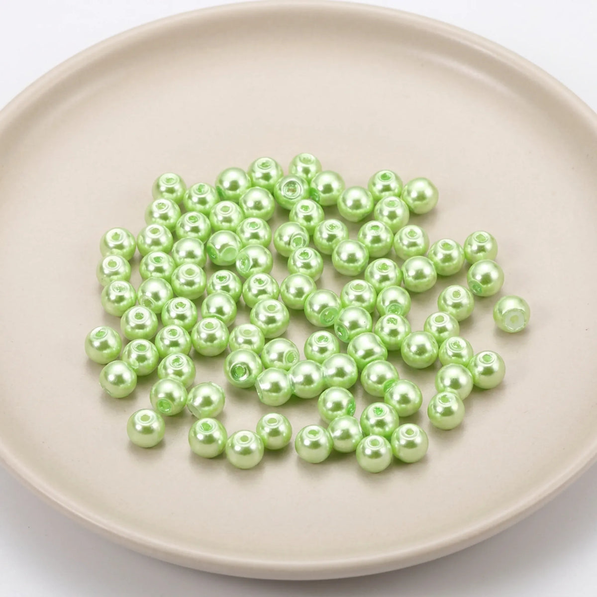 Smooth green glass pearl round beads with pearl coated finish