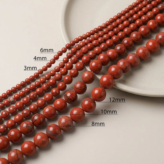 Natural red jasper beads available in multiple sizes