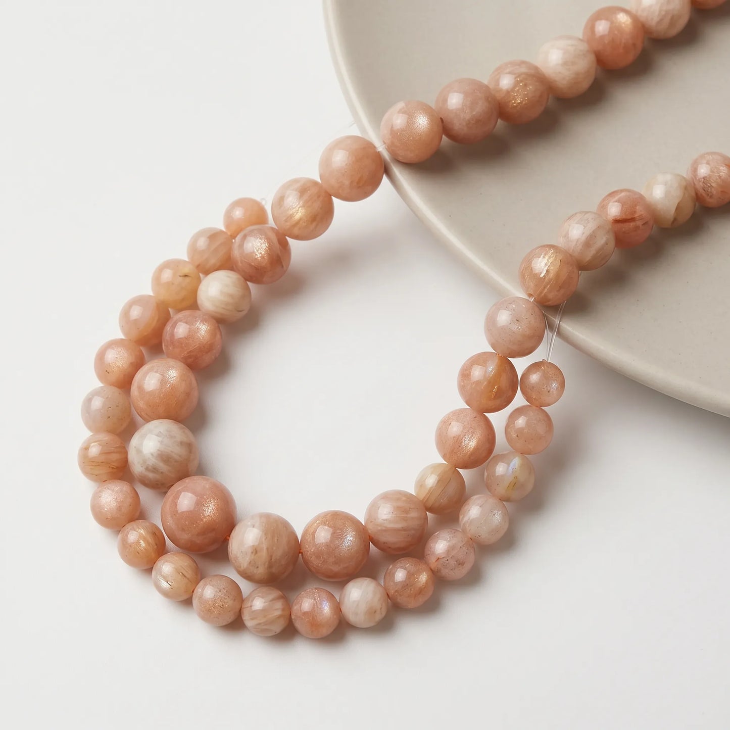 Round brown sunstone beads with smooth surface