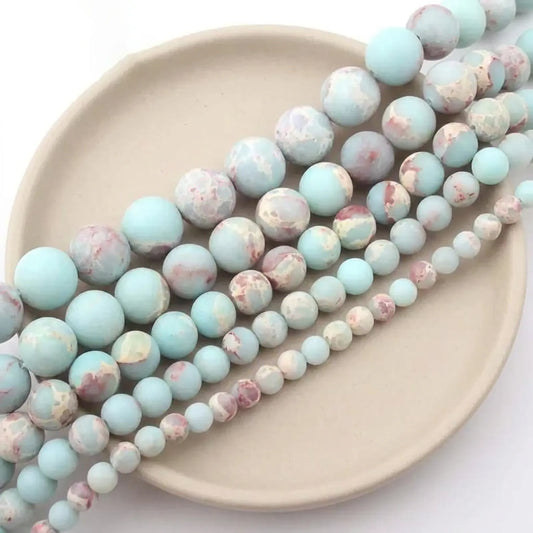 Shoushan stone round beads in assorted sizes with matte blue, cream and pink patterns
