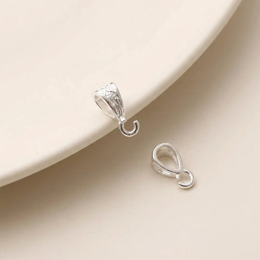Sterling silver pendant bails with open jump rings for attaching pendants and charms
