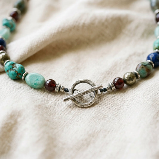 Toggle clasp securing a handmade gemstone necklace