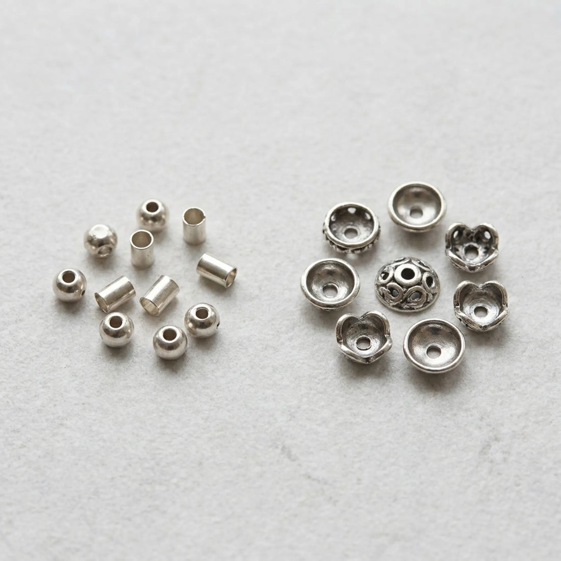 Crimp beads and decorative bead caps for jewelry making shown as separate jewelry findings