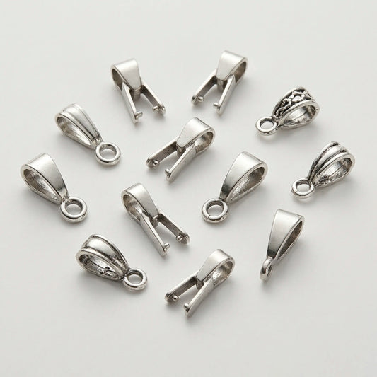 Different types of jewelry bails for attaching pendants to necklaces
