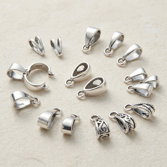Different types of sterling silver bails for pendants including pinch snap-on loop and decorative bails
