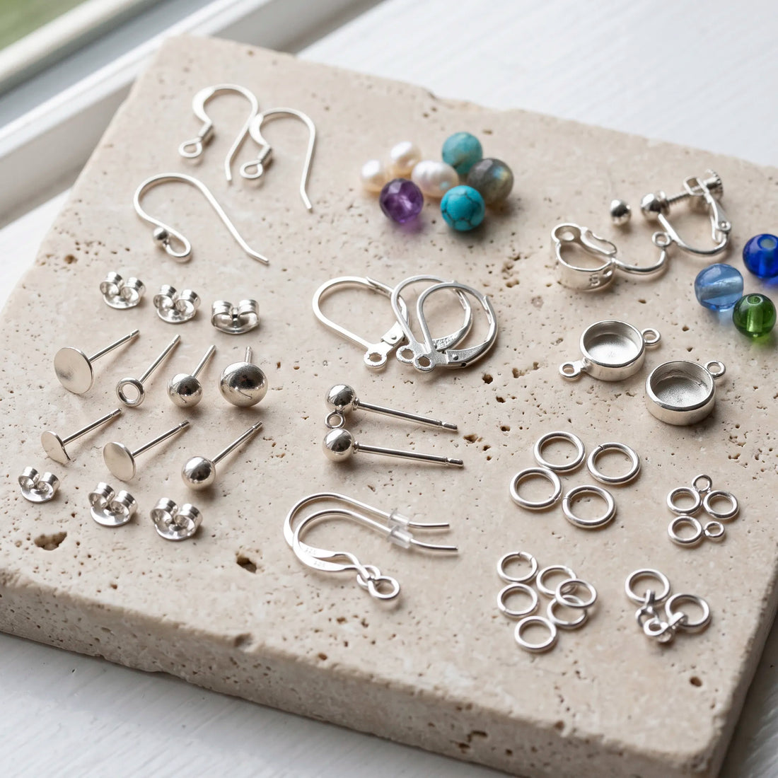 Sterling silver earring findings including hooks ear wires posts backs leverback findings and earring settings