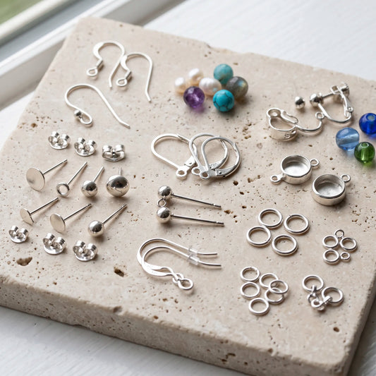 Sterling silver earring findings including hooks ear wires posts backs leverback findings and earring settings