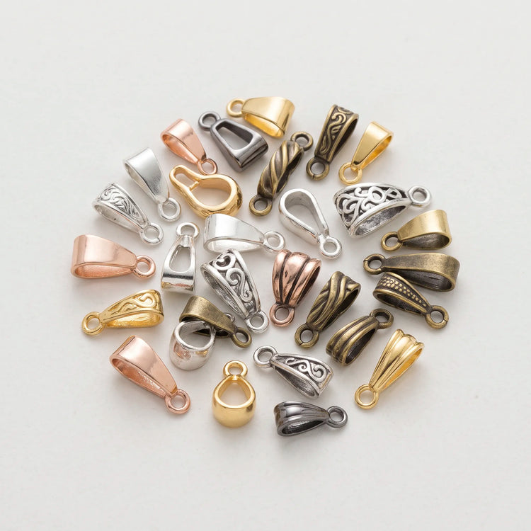Jewelry bails for pendants in different styles and metal finishes