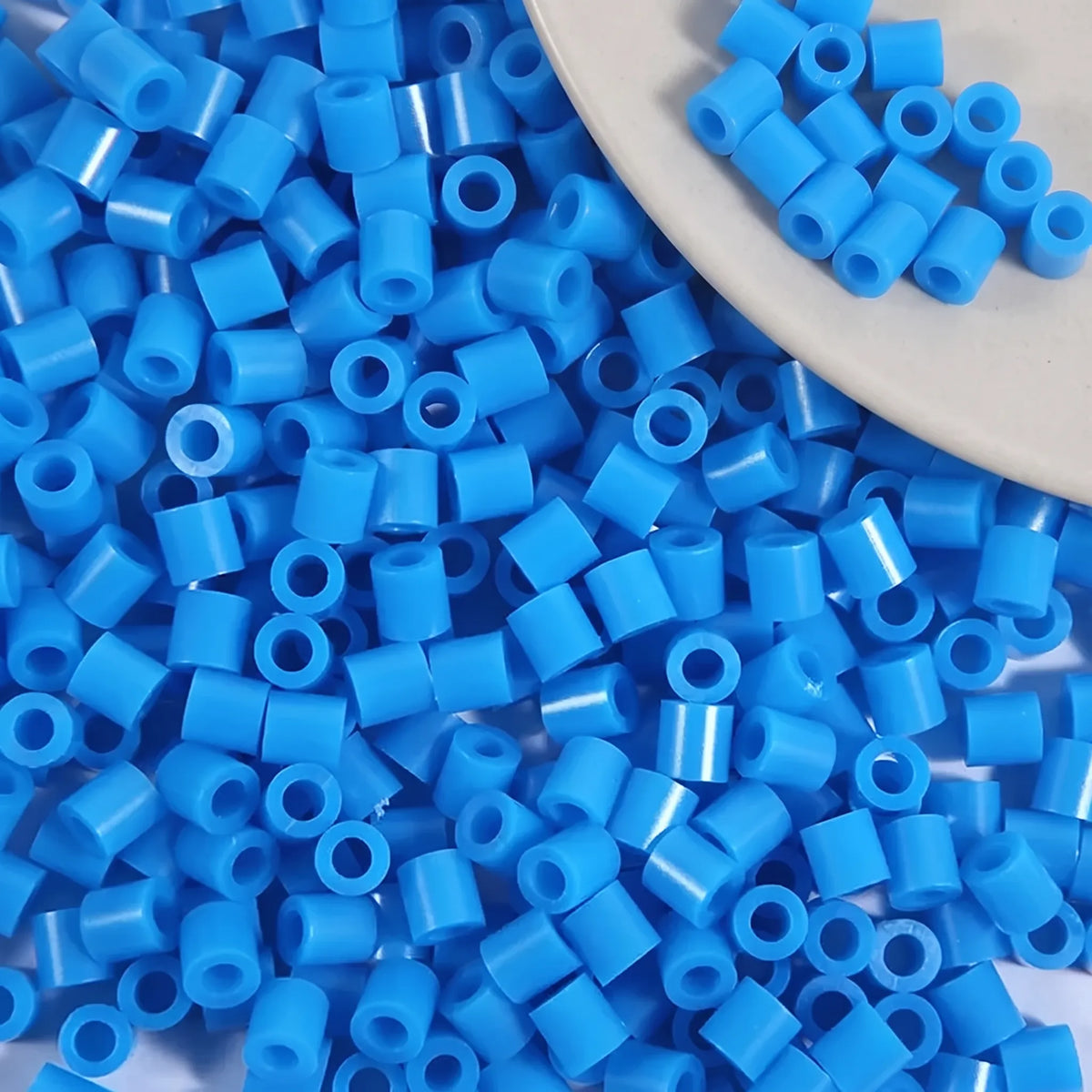Bright blue 5mm cylinder fuse beads with large holes