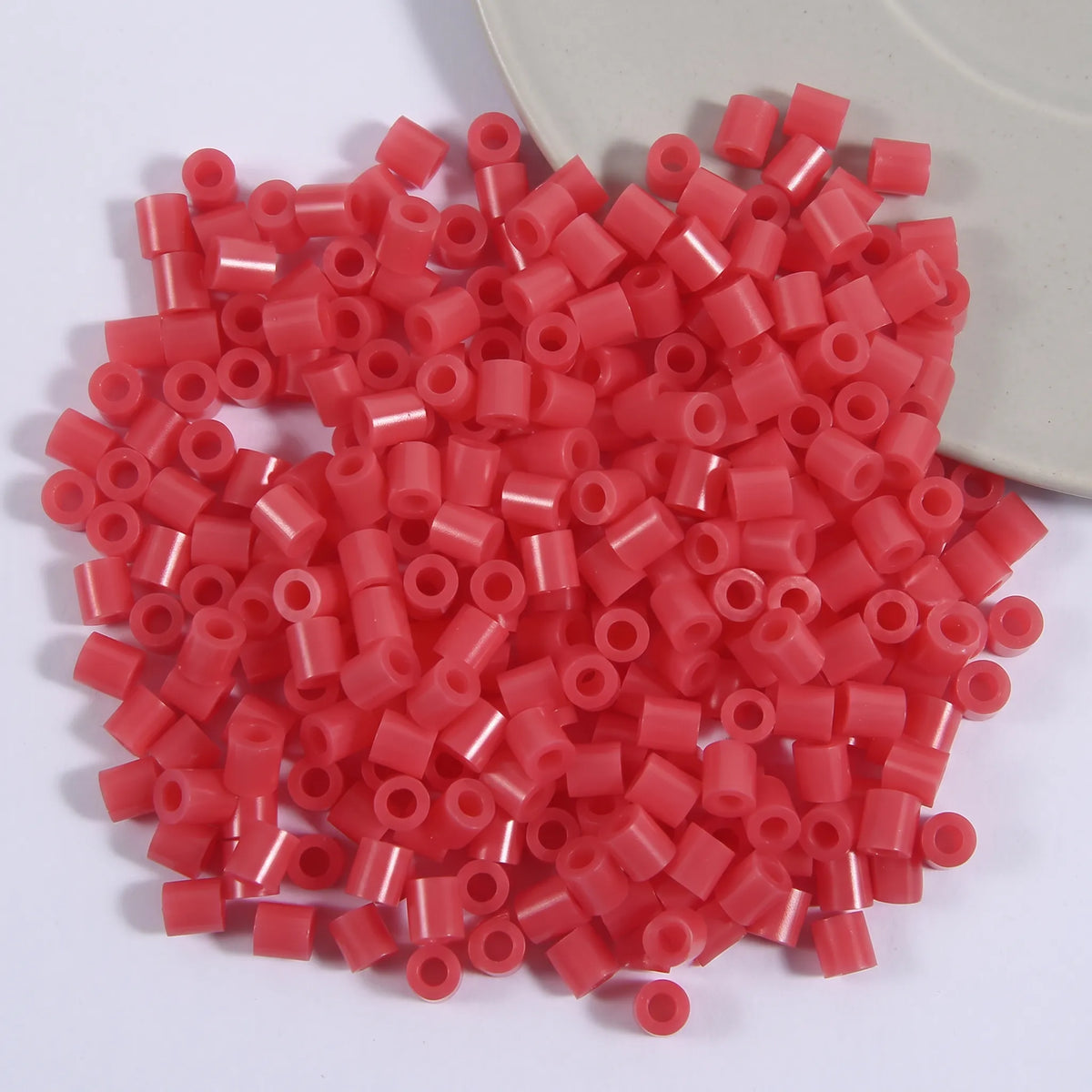 Coral pink 5mm cylinder fuse beads with large holes