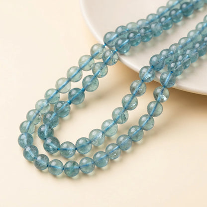 8mm natural blue fluorite round beads on a 15.5 inch strand