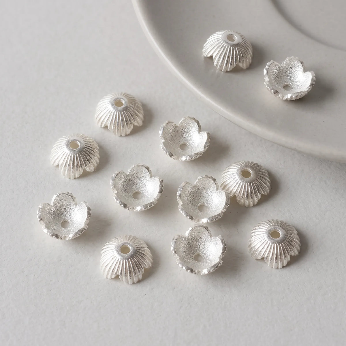 925 silver 7.5mm bead caps shown from exterior and interior sides