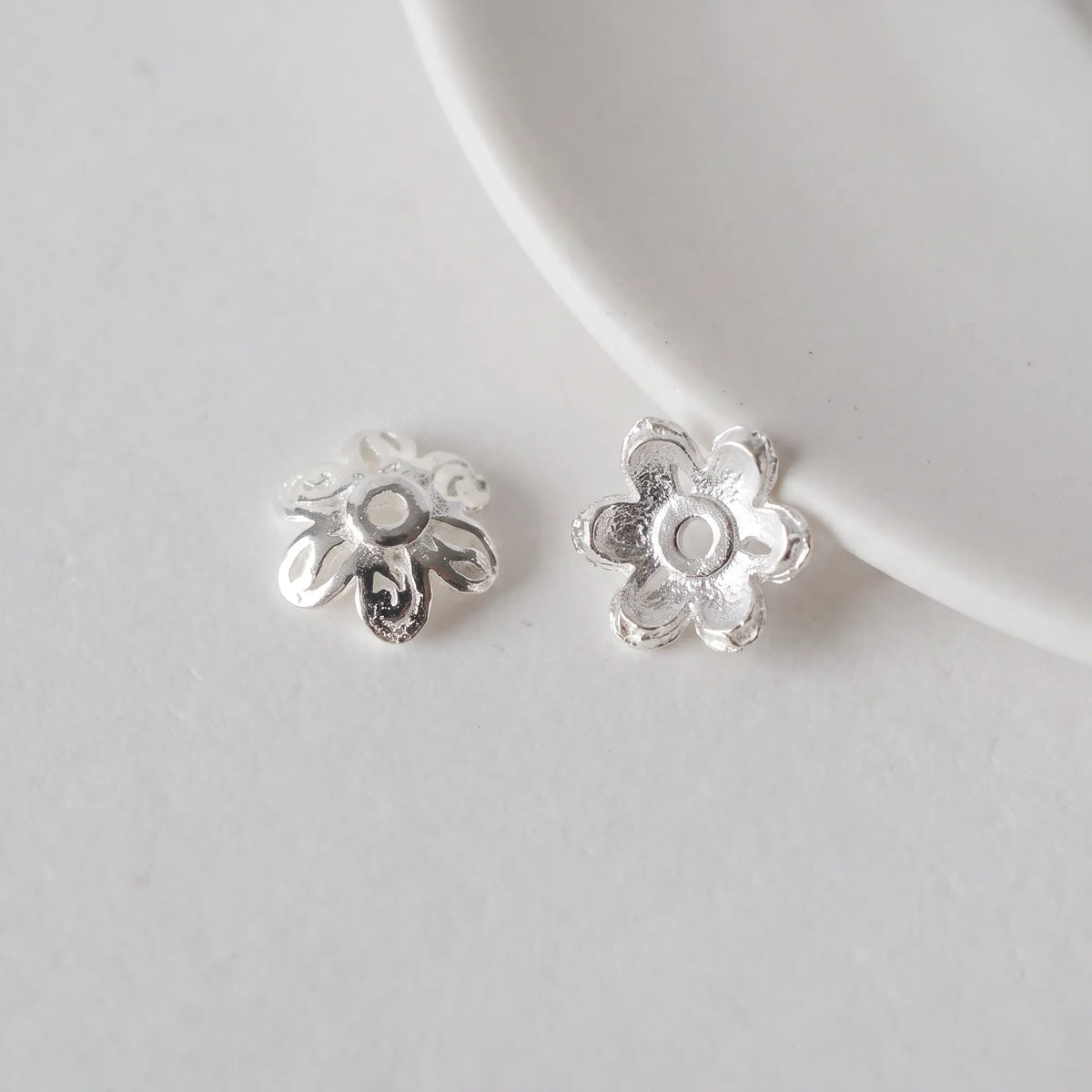 925 sterling silver flower bead caps showing front and back design