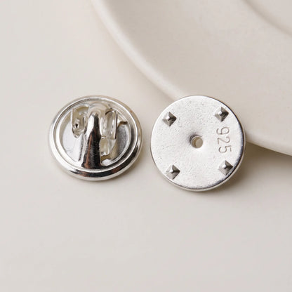 925 sterling silver locking pin back shown from front and back with 925 hallmark