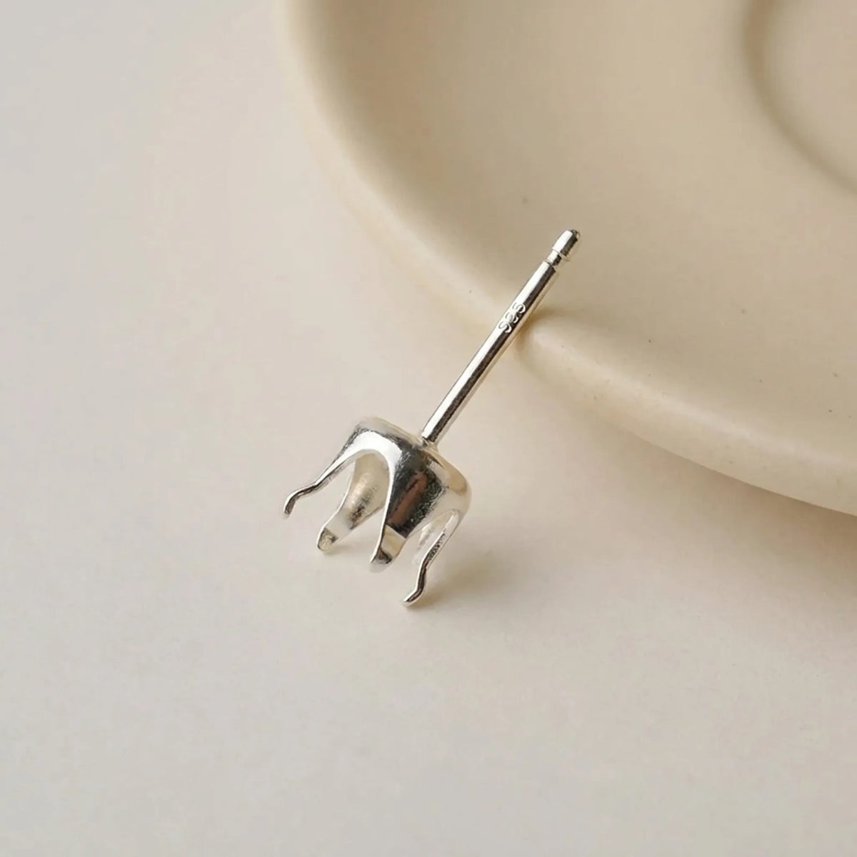 925 sterling silver Snaptite earring post setting showing 4-prong round stone mount