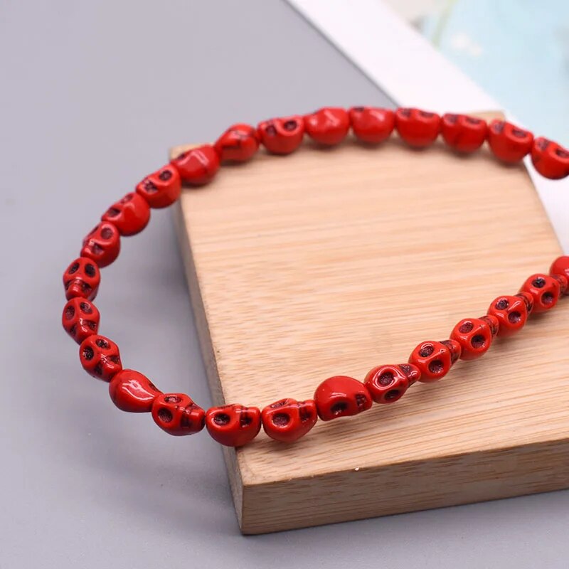 Rote Howlith-Totenkopfperlen, 12x13mm