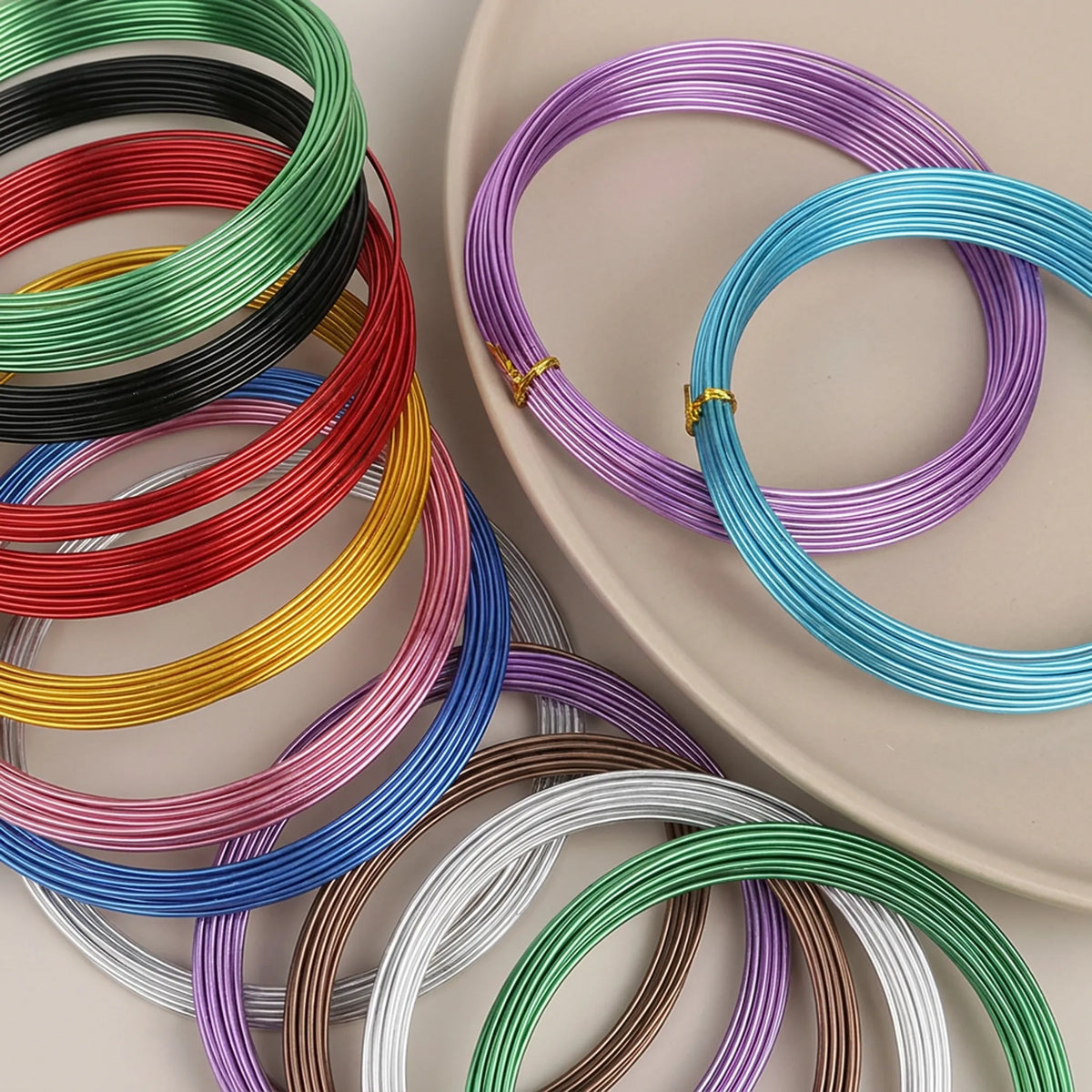 Close up of smooth anodized round aluminum craft wire
