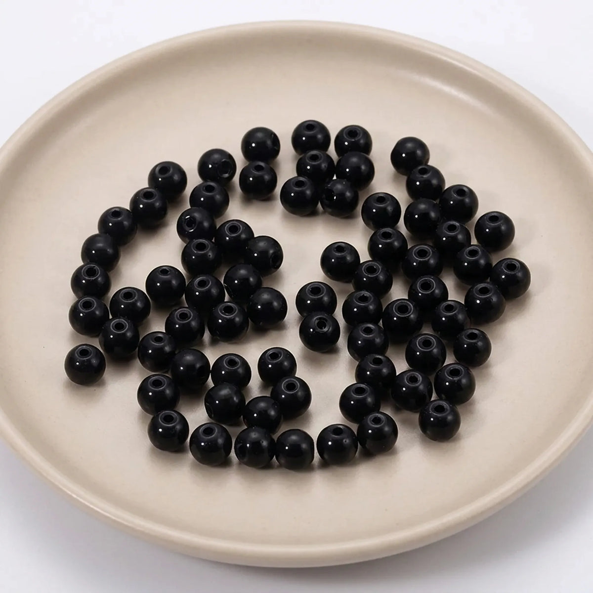 Black glass pearl beads used for bracelet and necklace jewelry making projects