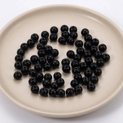 Black glass pearl beads used for bracelet and necklace jewelry making projects