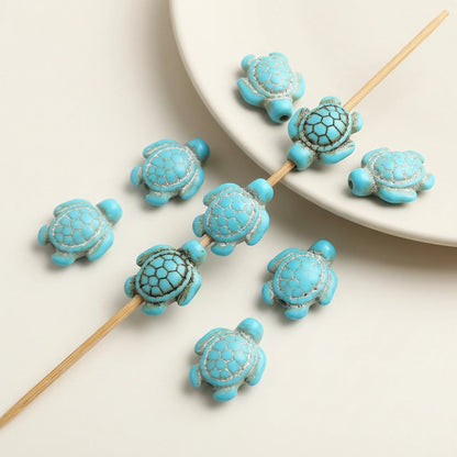 Blue carved turtle howlite beads 14x18mm with detailed shell pattern