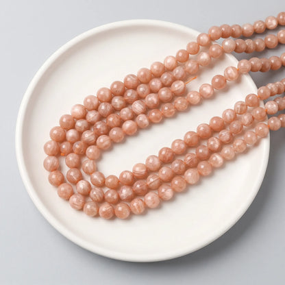 Brown sunstone beads round smooth stone strand
