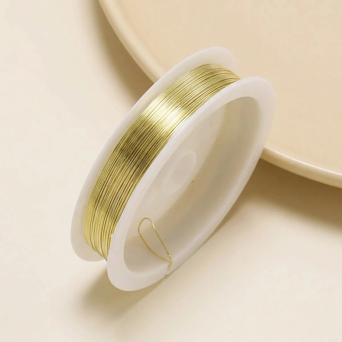 Champagne colored copper beading wire roll for jewelry making