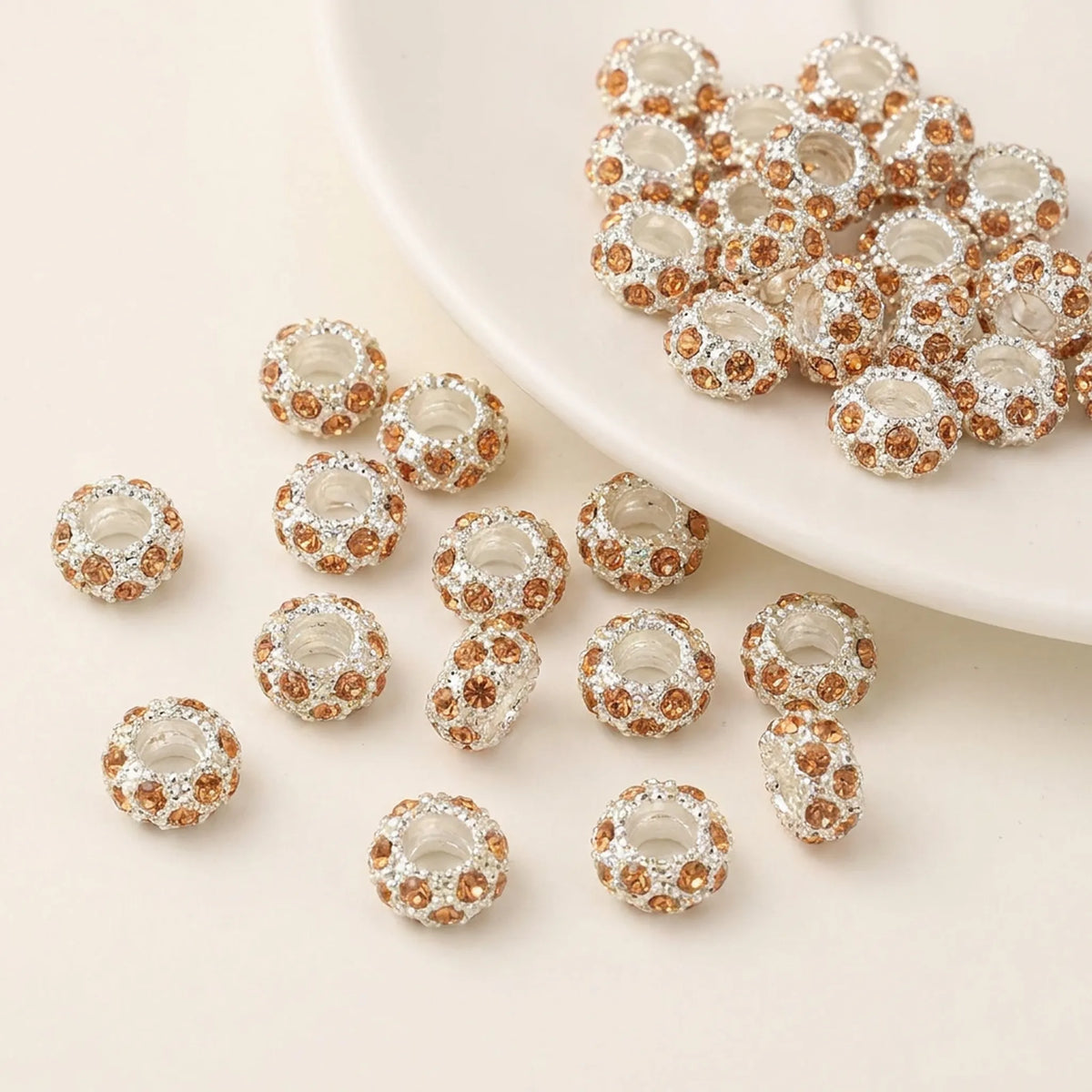Champagne rhinestone spacer beads with large holes and silver tone finish