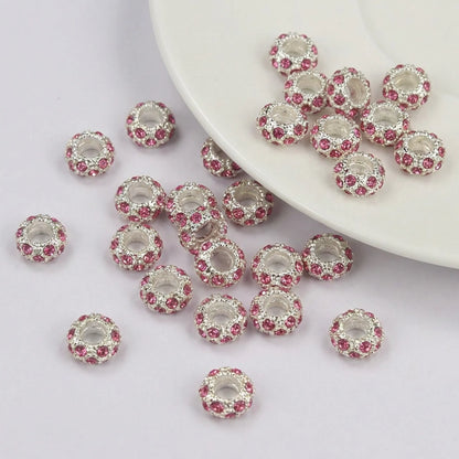 Rose pink crystal rhinestone rondelle spacer beads 10mm with silver tone finish