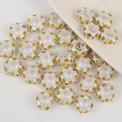 Yellow crystal rhinestone rondelle spacer beads 10mm with silver tone finish