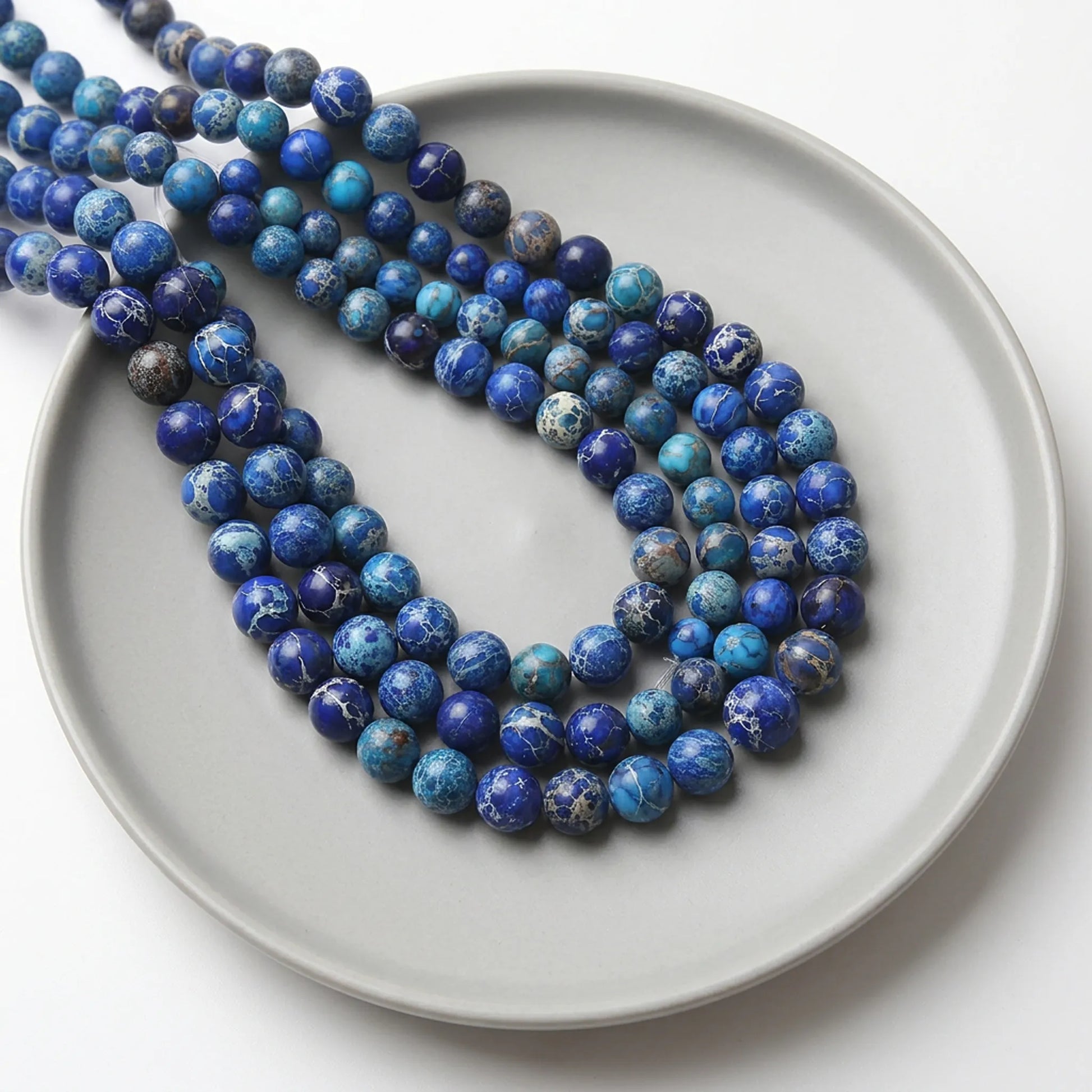 Dark blue sea sediment jasper beads round stone strand