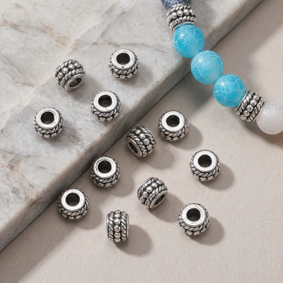 Decorative barrel spacer beads used in a handmade bracelet