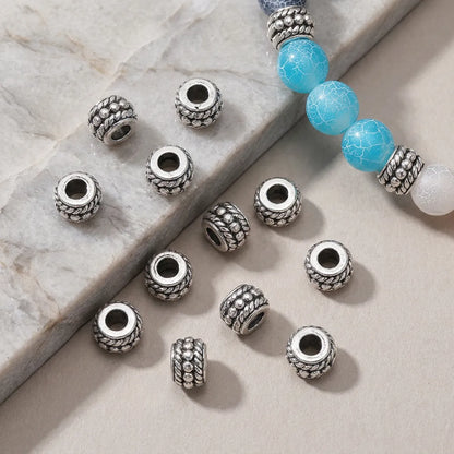 Decorative barrel spacer beads used in a handmade bracelet
