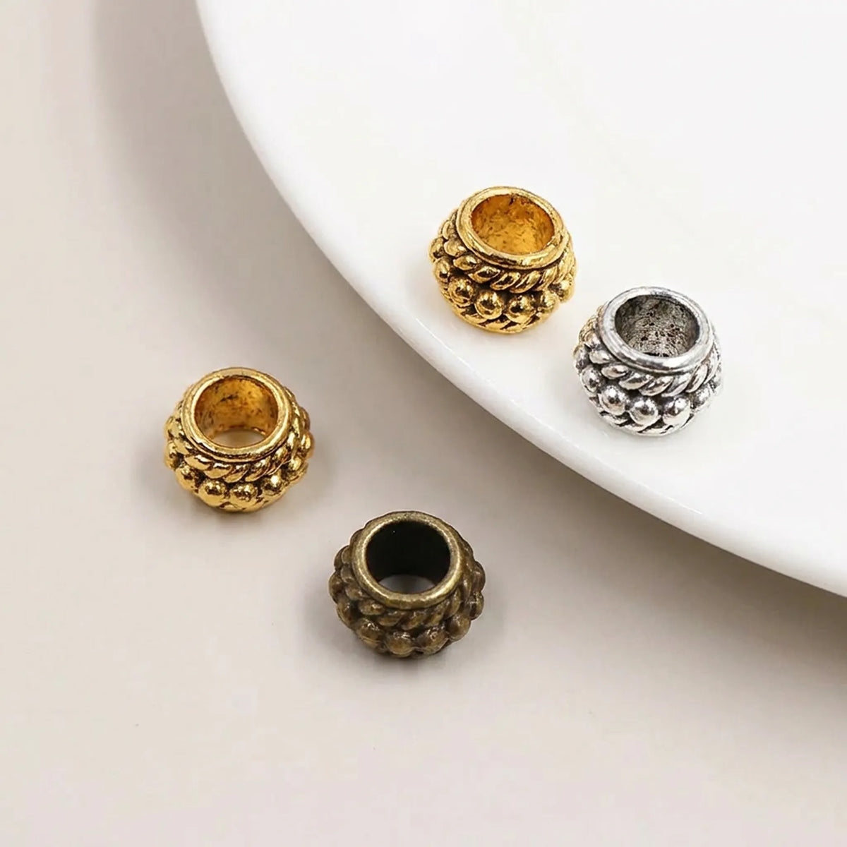 Close up of decorative barrel spacer beads