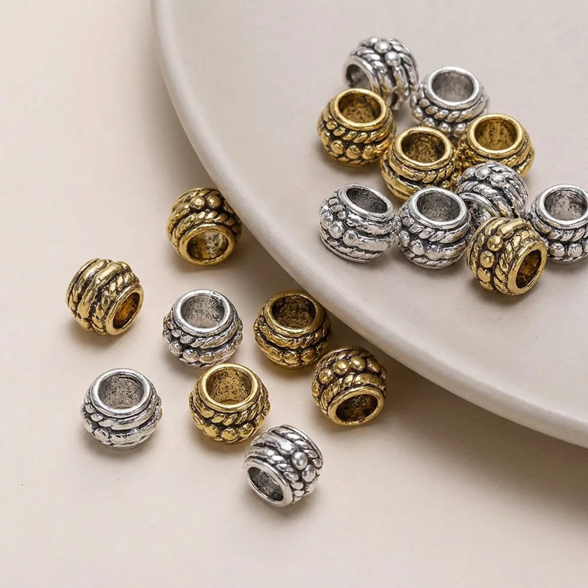Engraved decorative barrel spacer beads detail