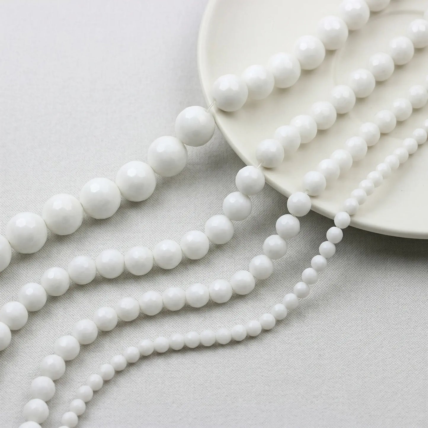 Faceted white alabaster beads round natural stone strand