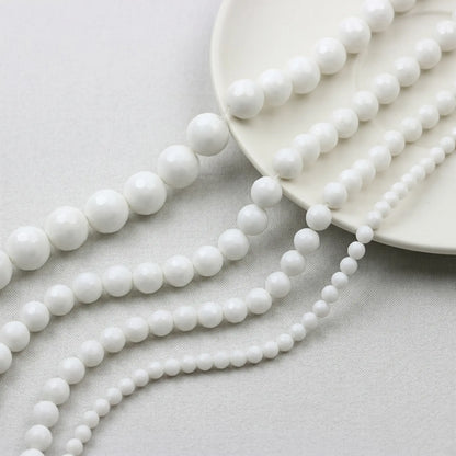 Faceted white alabaster beads round natural stone strand