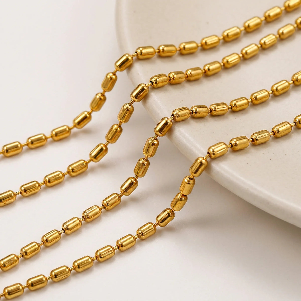 Gold cylindrical bead chain for jewelry making