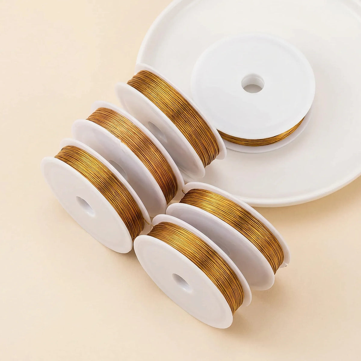 Gold color stainless steel beading wire available in multiple diameters
