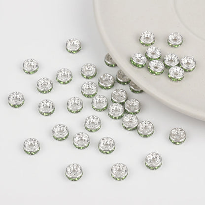 Green crystal rhinestone spacer beads with center holes for bracelets, necklaces and jewelry making