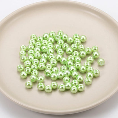 Smooth green glass pearl round beads with pearl coated finish