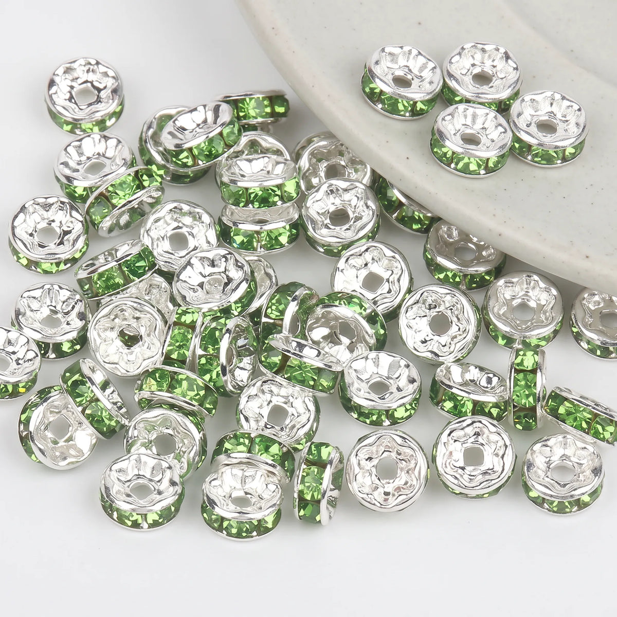 Green crystal rhinestone rondelle spacer beads with silver color metal settings for jewelry making