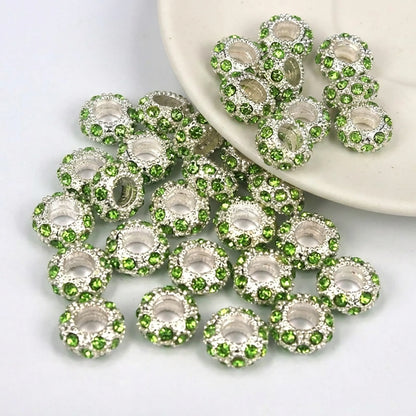 Green rhinestone spacer beads with large holes and silver tone finish