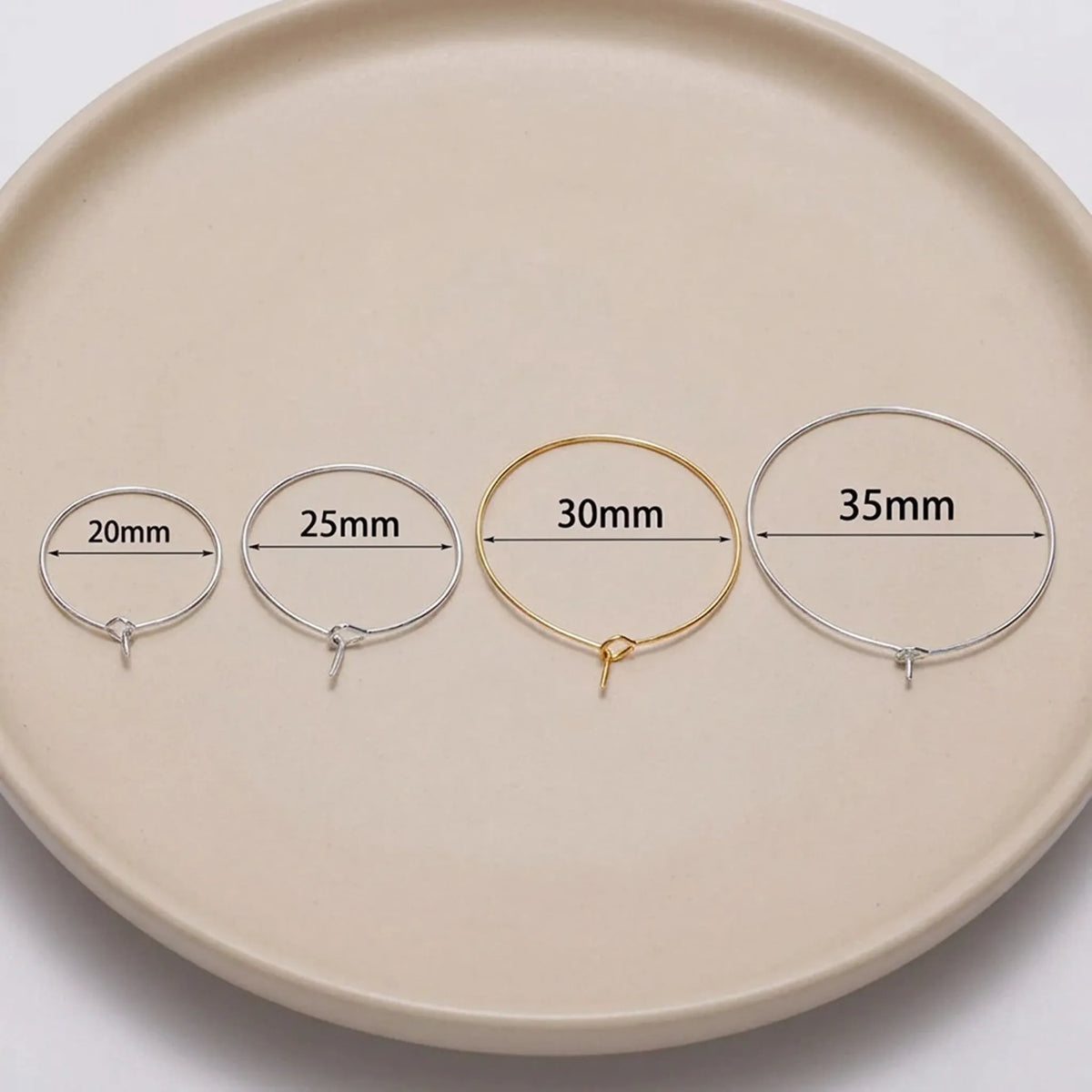 Large hoop earring wire size comparison showing 20mm 25mm 30mm and 35mm round hoop earrings for jewelry making