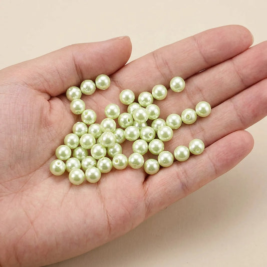Light Green Czech Glass Pearl Beads Round Loose Glass Beads Shown in Hand for Size Reference