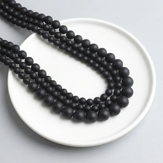 Matte black onyx beads round stone strand