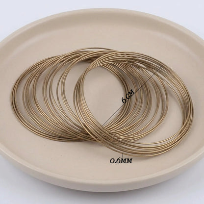 100 Loops 0.6mm Memory Steel Wire Bracelet Rings for Jewelry Making 6cm Diameter